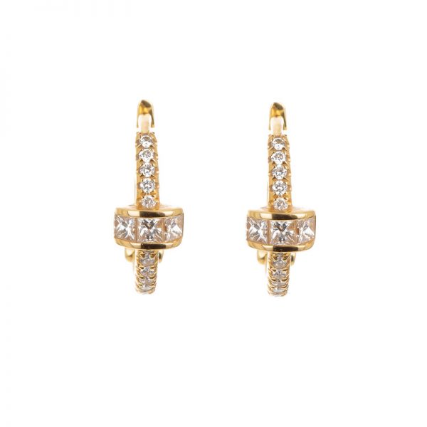 Gold Huggies earrings online from Kajal Naina